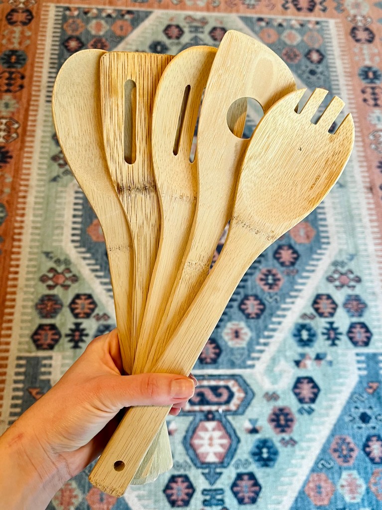 Photos of wooden kitchen utensils prior to boiling, during boiling, and after boiling.